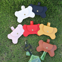 Porte-sacs à déjections pour animaux de compagnie en cuir PU, forme os créative, portable et durable, pour la maison et l'extérieur
