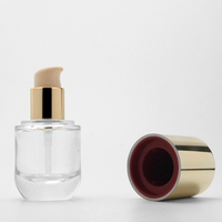 Vente en gros de flacons de lotion à bouchon doré ronds transparents 30ml, tête de pompe pour fond de teint, flacon d'essence en plexiglas pressé avec pompe