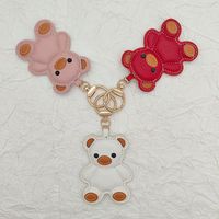 Nouveau porte-clés ours sac breloque PU cuir clé pendentif pour sacs ou voiture élégant porte-clés accessoire