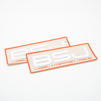 Écussons en silicone TPU 3D sur base tissée personnalisée, badges en caoutchouc à dos tissé, étiquettes logo autocollantes pour sacs à dos et vêtements