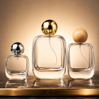 Flacon de parfum en verre transparent rond de luxe 30 ml 50 ml avec boîte et sac, impression et gravure personnalisables