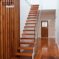 Escalier flottant personnalisé en acier et bois avec garde-corps en verre simple face pour intérieurs et lofts, villas duplex, design droit