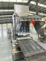 Ligne de production de nuggets de poulet de style KFC McDonald, ligne de formage automatique, d'enrobage, de friture, de congélation IQF et d'emballage