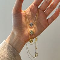 Kalung Liontin Dylam Model Terbaru Berbahan Perak 925 Lapis Rhodium dan Emas 14K 18K dengan Rantai Model Bunga Semanggi Berdaun Empat