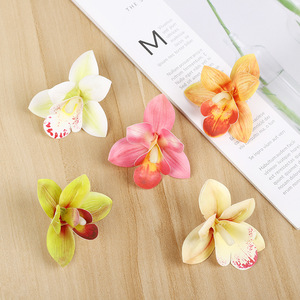 ดอกกล้วยไม้ฟาแลนนอปซิสประดิษฐ์สีขาวนม ชมพู ส้ม เหลือง เขียวอมฟ้า เหลืองอ่อน ขนาด 7 ซม. สำหรับตกแต่ง จากร้านขายดอกไม้ยี่หวู่ ต้าถัว - Product Image 1
