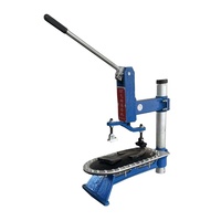 Machine manuelle de pressage et de fixation de semelles pour chaussures de sport et baskets