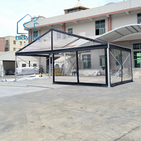 Tente de réception de luxe en aluminium noir avec toit transparent et parois en verre trempé pour mariage, banquet et gala en extérieur