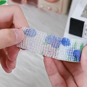 Vendajes para los dedos bonitos y elegantes, perfectos para estudiantes que escriben y que ayudan a prevenir la irritación de las manos. Hecho de tela elástica no tejida. - Product Image 3