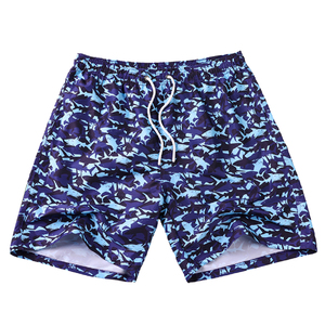 Excellente conception impression numérique couleur bleue résistant à l'eau 100% polyester short de plage avec motif animal pour hommes