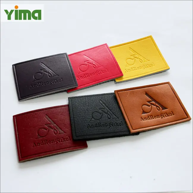 Custom LOGO Soft Debossed Stamp Foldable PU Patch Leather Label For Clothing Handbags And Jeans Garment
