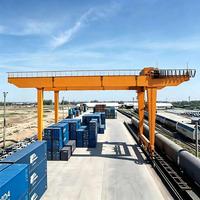 Grue portuaire à portique double poutre de 35 tonnes personnalisable, montée sur rail, type RMG, pour opération en entrepôt logistique de conteneurs