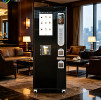 Distributeur automatique de café à paiement par pièces, pour usage scolaire