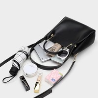 Sac seau pour femme en cuir PU de qualité supérieure, logo personnalisé OEM ODM, vente en gros, sac à main minimaliste, poignée en métal raffinée, sac à bandoulière