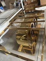 Table à manger de luxe avec cadre en métal en acier inoxydable et marbre