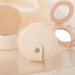 Oval Pu Leather <b>Compact</b> <b>Mirror</b> Double Sided Folding With Snap Button Closure Portable Pocket <b>Mirror</b> For Women Girls Wholesale - Product Image 1