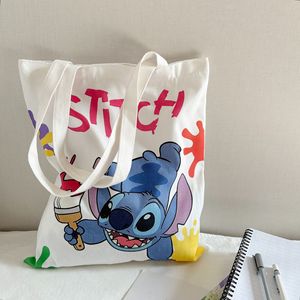 Borsa in tela all'ingrosso con cartone animato Stitch, borsa a tracolla semplice e carina, borsa tote di grande capacità, zaino scolastico in tela per studenti, peluche - Product Image 1