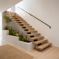 Solution technique de fabrication sur mesure haut de gamme pour escalier mono-poutre dans un intérieur de villa contemporaine
