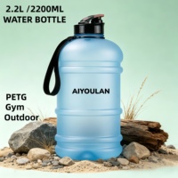 Bouteille d'eau en plastique PETG de grande capacité 2,2 litres, anti-fuite, 64 oz, sans BPA, réutilisable, design personnalisé, pour la salle de sport et les sports
