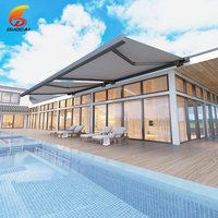 Auvent de balcon électrique à télécommande moderne en aluminium avec voile en acrylique enduit de PVC extensible et résistant au vent DUOCAI