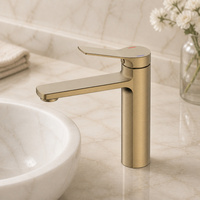 Robinet de lavabo monocommande contemporain en laiton brossé doré, à montage sur plan, avec cartouche céramique