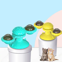 Vente en gros Jouet interactif multifonctionnel pour chat Ventouse de toilettage Molaire en caoutchouc Boule roulante pour chat