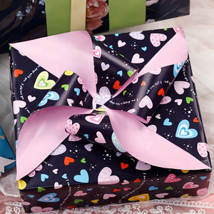 Rollo de papel de lujo de doble cara para cumpleaños al por mayor de fábrica, papel de regalo de 43cm X 3M para embalaje - Product Image 5