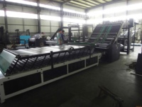 Machine à laminer semi-automatique pour flûtes
