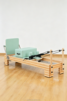 Pilates Reformer en Hêtre et Érable avec 6 ressorts en fil de piano allemand, barre réglable à 7 positions, poulie inférieure, usage commercial, portable