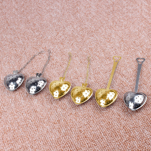 Custom-made 304 stainless steel heart-shaped <b>tea</b> strainer with handle and chain. - Product Image 1