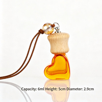Vente en gros de flacons diffuseurs d'arômes pour voiture suspendus, colorés, de 6 ml, en forme de cœur, flacons de parfum pour voiture vides avec bouchon à vis