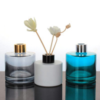 Bouteilles de diffuseur à roseaux en verre rondes personnalisées OEM ODM 100ml 150ml, vides et rechargeables, pour parfums et arômes, avec bouchon à vis