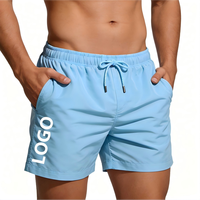 Shorts de plage pour hommes en couleurs unies, fabrication OEM, vente en gros, longueur au-dessus du genou, shorts de surf, shorts de sport pour les vacances