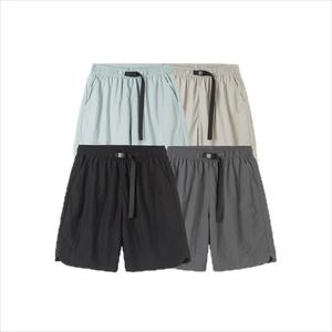 Short à motif solide respirant léger et décontracté avec ceinture en maille et poches Short de style plage vente en gros - Product Image 1