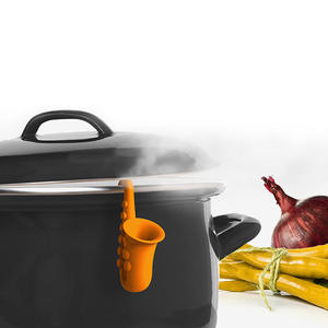 Elevador de tapas de olla de silicona con forma de saxofón, espaciador antidesbordamiento, utensilio de cocina - Product Image 1