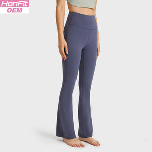 Di alta qualità <span class=keywords><strong>in</strong></span> nylon 80% 20% spandex da donna a vita alta da donna con Leggings da Yoga <span class=keywords><strong>in</strong></span> tinta unita da donna - Product Image 2