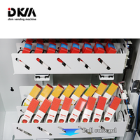 Distributeur automatique de cigarettes mural compact DKM avec écran tactile 32 pouces et lecteur de carte pour vérification de l'âge.