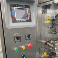 Machine d'emballage automatique verticale pour sachets de poudre de noix sèches 50g, de poudre de thé aux herbes 100g, et de poudre de matcha/cacao avec dosage
