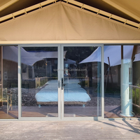 Tente safari de luxe en toile imperméable quatre saisons pour le glamping, tentes safari de glamping d'hôtel en plein air
