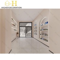 Conception moderne de magasin de cosmétiques en bois sur mesure, présentoirs de parfums et de soins de la peau sur mesure pour les intérieurs de vente au détail, présentoir de parfums