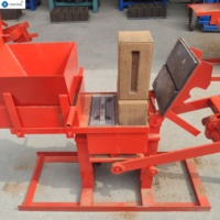 Presse manuelle populaire et écologique pour la fabrication de briques en terre cuite emboîtables