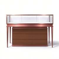 Comptoir de présentation de bijoux en verre or rose moderne avec éclairage LED et tiroirs de rangement en bois pour magasin de détail et salle d'exposition