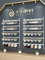 Présentoir à lingerie mural en or personnalisé avec étagère pour soutiens-gorge et sous-vêtements pour la décoration et le design de magasin