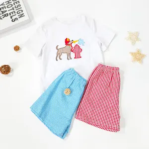 Vente en gros de vêtements pour chiots pompiers garçons chemises avec applique chien de feu pour enfants ensemble court seersucker assorti vêtements à blouse d'été