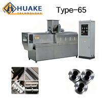 Extrudeuse industrielle à double vis en acier inoxydable pour la production de produits alimentaires sur ligne de transformation