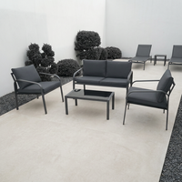 Ensemble de conversation de patio moderne en aluminium gris foncé, 4 pièces, avec table basse en verre trempé, coussins imperméables