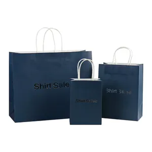 Bolsa de papel Kraft blanco de lujo con logotipo de lámina de plata personalizado, bolsas de compras de papel para ropa de regalo con asa retorcida