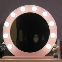 Miroir de maquillage LED rond sur pied avec éclairage LED résistant à l'eau, rose, sur mesure pour studio de beauté