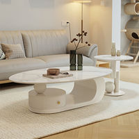 Table basse créative de style crème pour salon, nouvelle collection 2025, ovale, petite, pour appartement