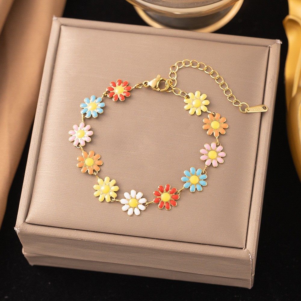 สร้อยข้อมือดอกเดซี่สีสันสดใส 9 เส้น สีทอง
