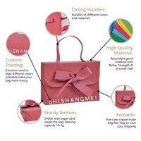 Sac d'emballage élégant en papier d'art C1S rose artisanal avec logo personnalisé, style enveloppe avec ruban, pour boutique de cosmétiques